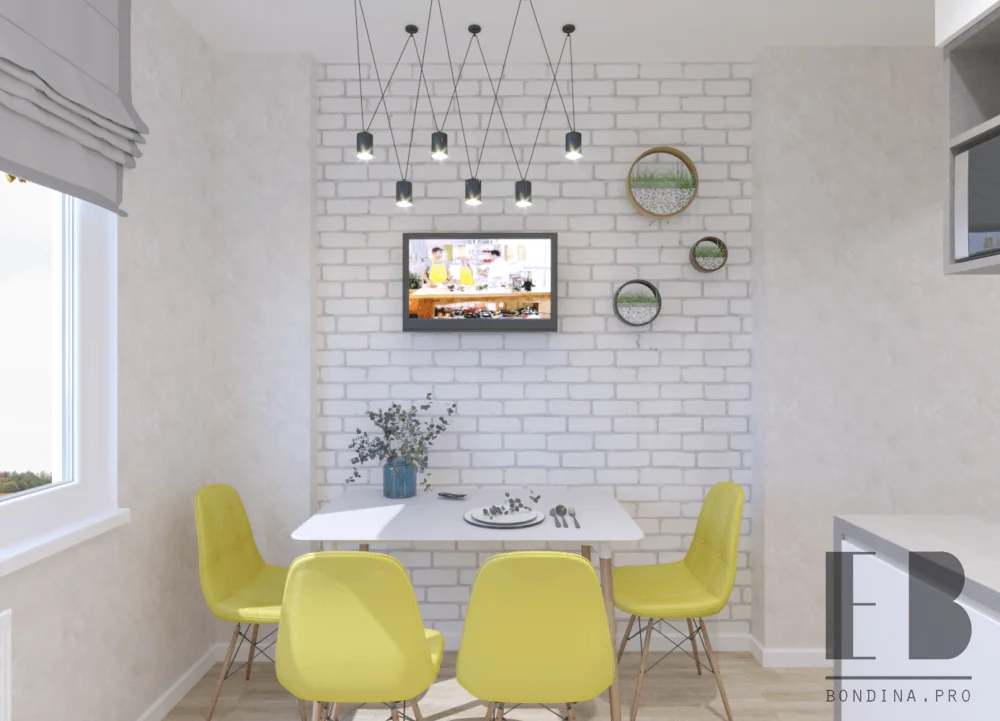 Дизайн белой кухни с кирпичной стеной и яркими стульями